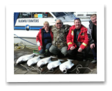 March 24, 2014: 23 to 29 lbs. Halibut - Constance Bank  - Bob, Terance, Audeen Jones from Grand Prairie with Darrel from Chemainus